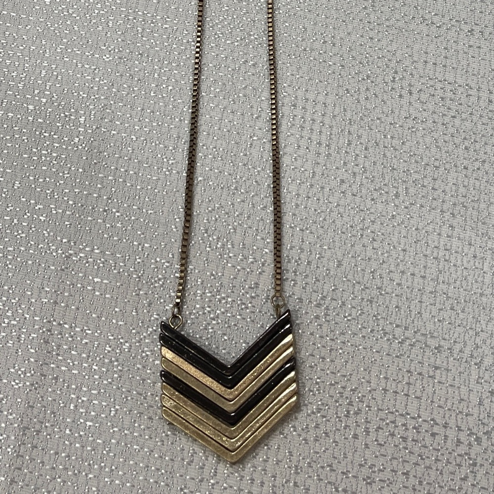 Long Gold Necklace with Striped Arrow Pendant